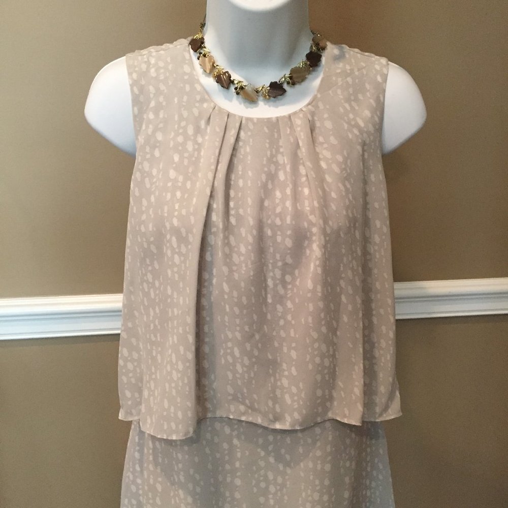 ✅Gray & White Dotted Sleeveless free flowing by: C